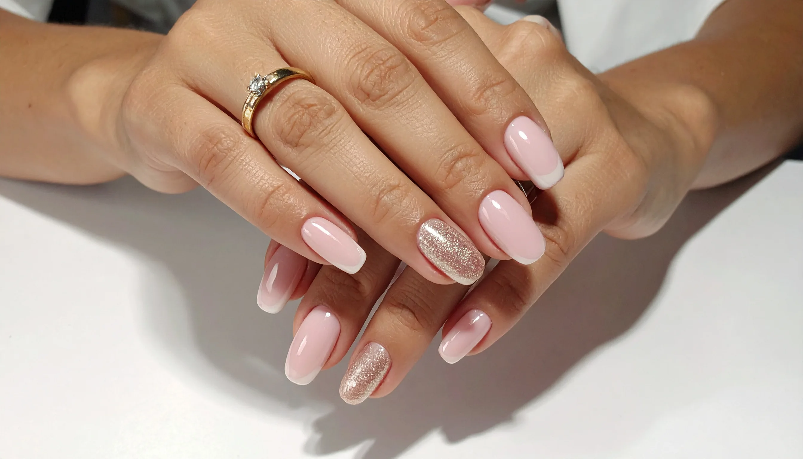 Pink manicure with glitter accent nail